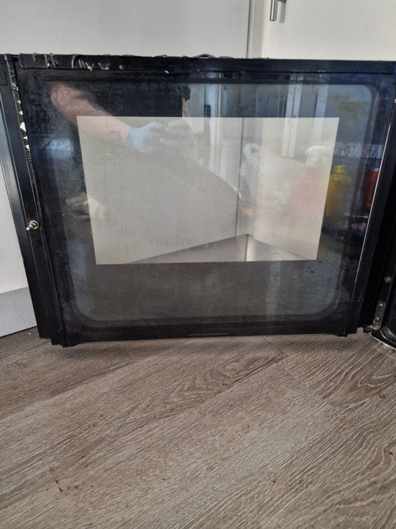 Oven door glass after cleaning — completely clear