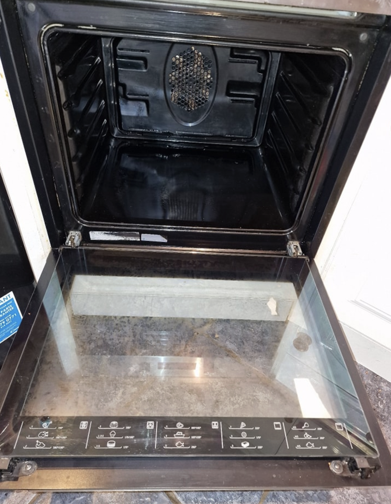 Oven interior after cleaning — shelves and cavity fully restored