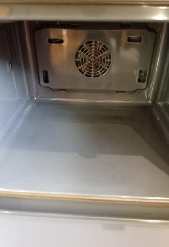 Oven interior after cleaning — base completely clean